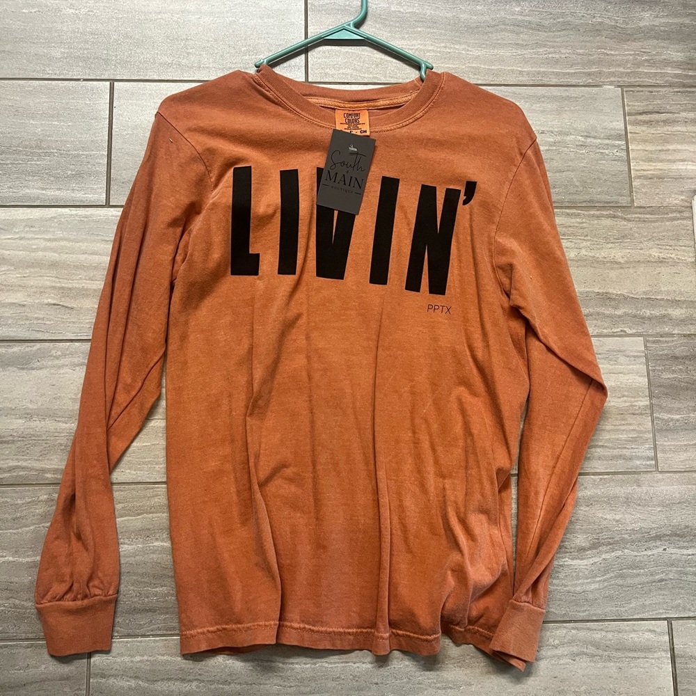 More of a vintage orange than the picture represents